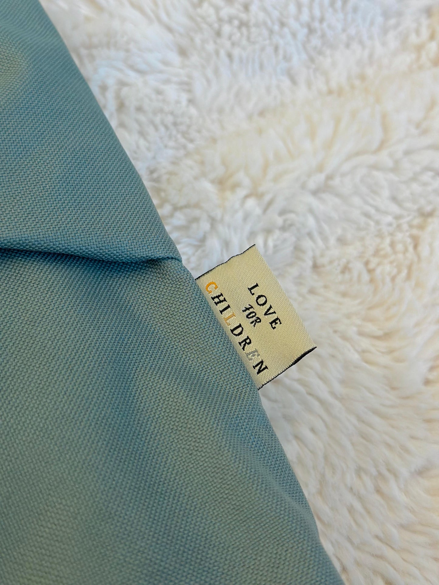 Rugtas kinderen - pastelgroen strik