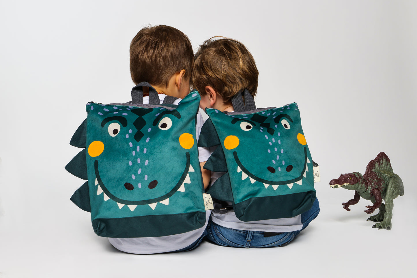 Rugtas kinderen - Dinosaurus